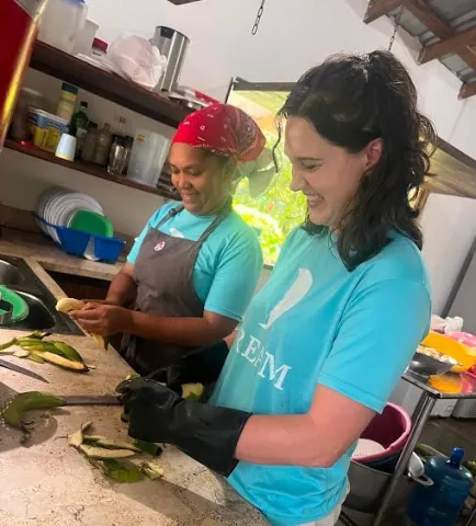 Me learning how to cook plátanos at the Dream Center