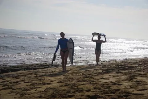 Ava and I returning from a morning of surfing at Playa Encuentro. Photo: Sandra Reyes